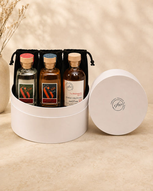 Coffret Premium CFW 3 x 25 cl ouvert avec trois bouteilles de spiritueux français