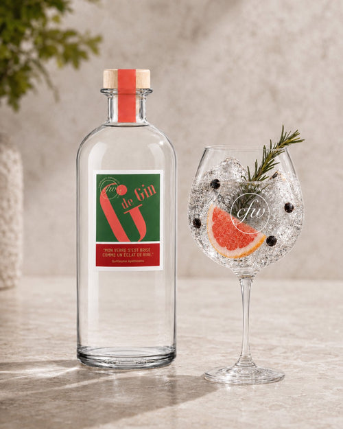G de Gin 70 cl servi en Gin Tonic avec pamplemousse, baies de genièvre et romarin